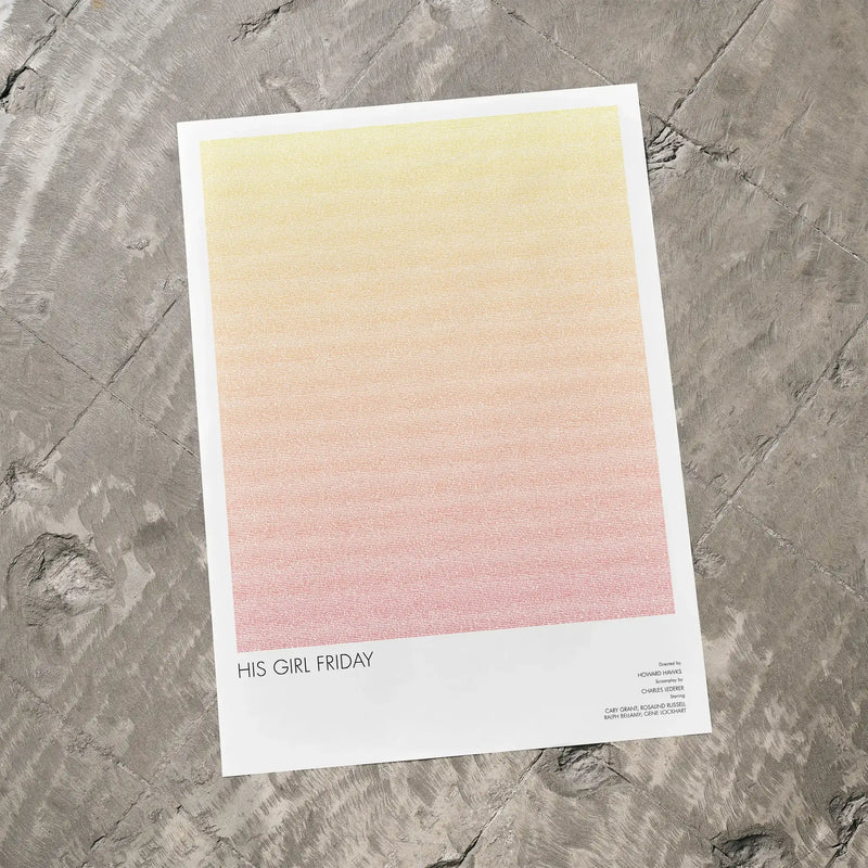 A His Girl Friday movie script poster laid flat on a textured floor surface.
