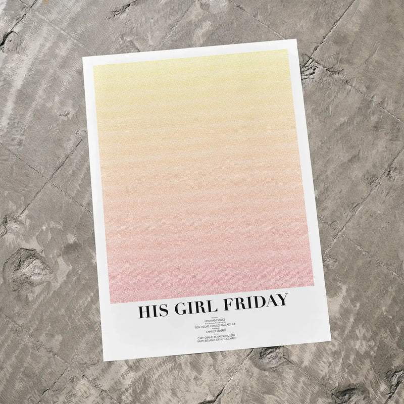 A His Girl Friday movie script poster laid flat on a textured floor surface.