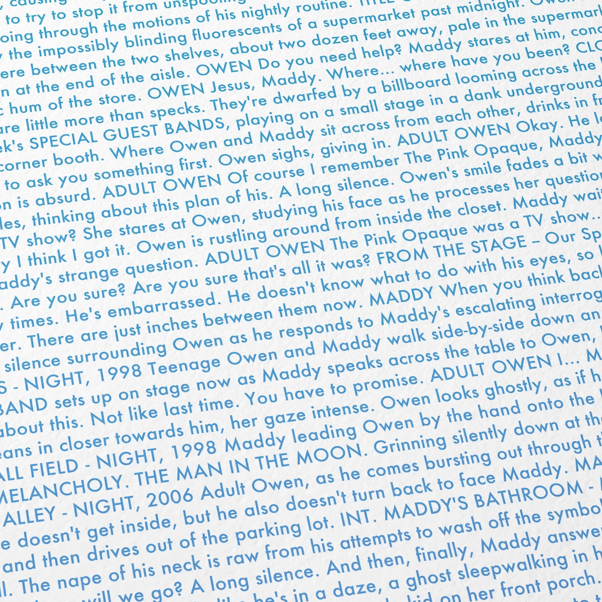Close-up detail of the I Saw the TV Glow movie script poster showing dense typographic text.