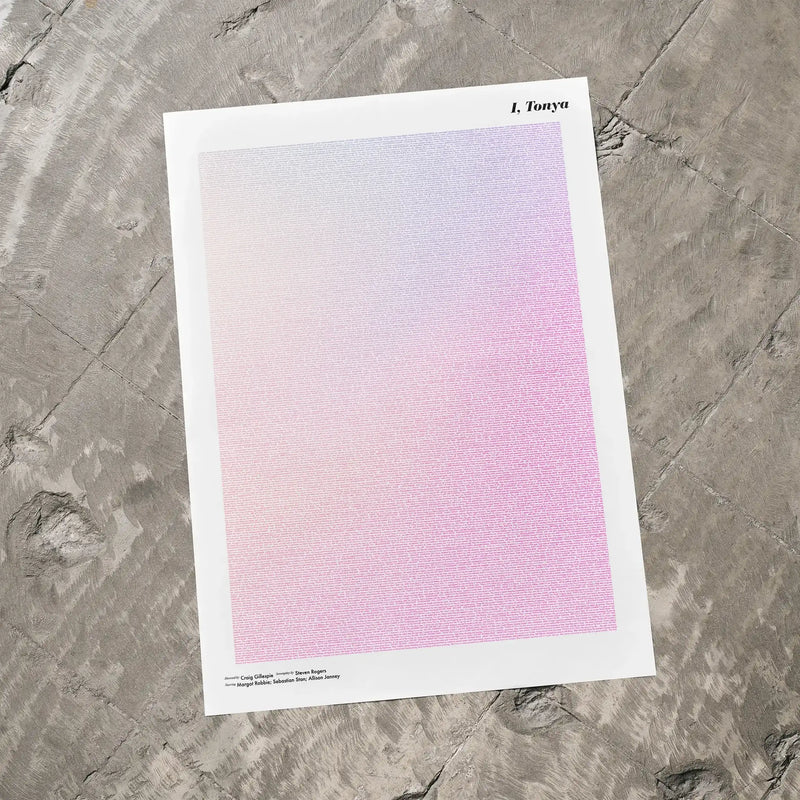 A I, Tonya movie script poster laid flat on a textured floor surface.