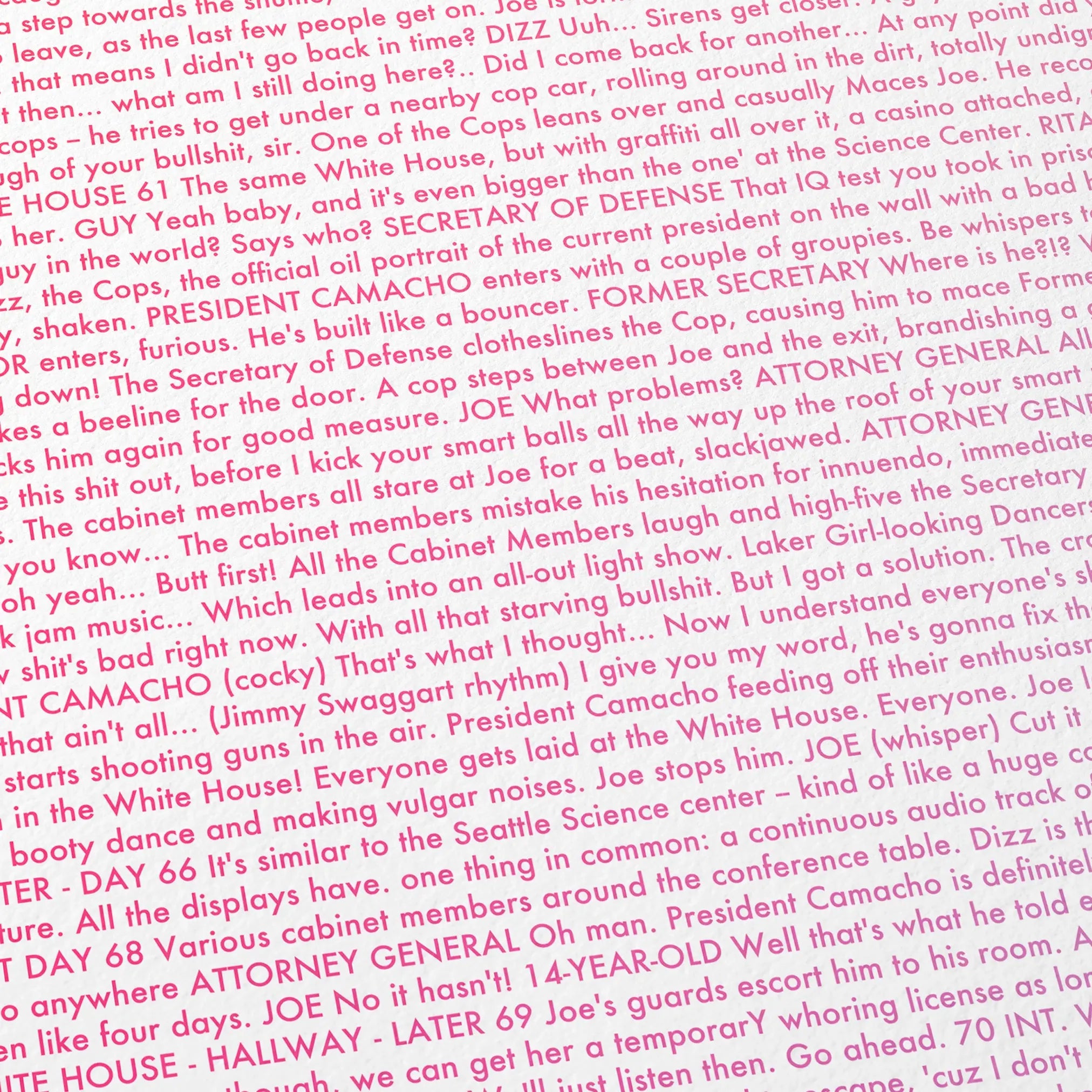 Close-up detail of the Idiocracy movie script poster showing dense typographic text.