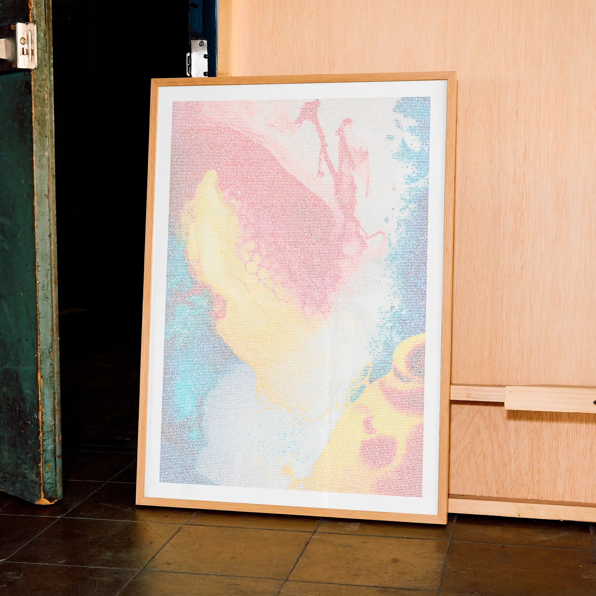 A framed Idiocracy movie script poster displayed in a contemporary interior setting.