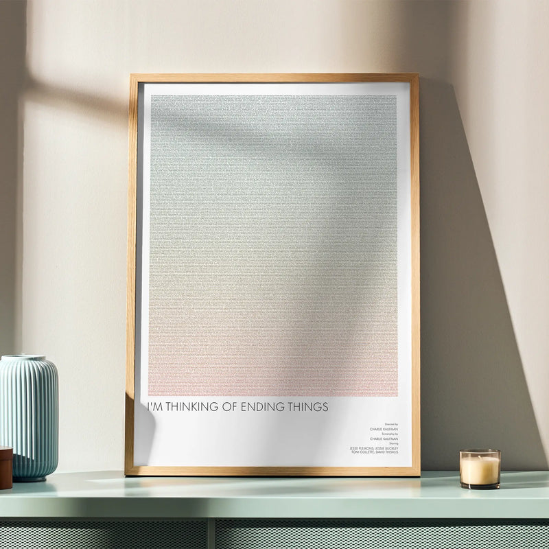 A framed I'm Thinking of Ending Things movie script poster displayed in a simple modern interior.