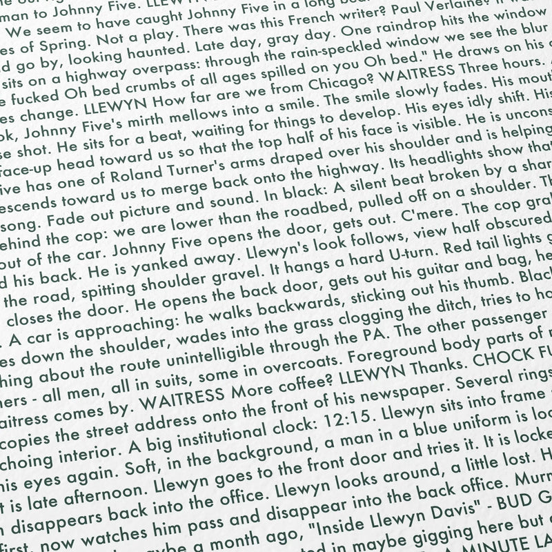 Close-up detail of the Inside Llewyn Davis movie script poster showing dense typographic text.