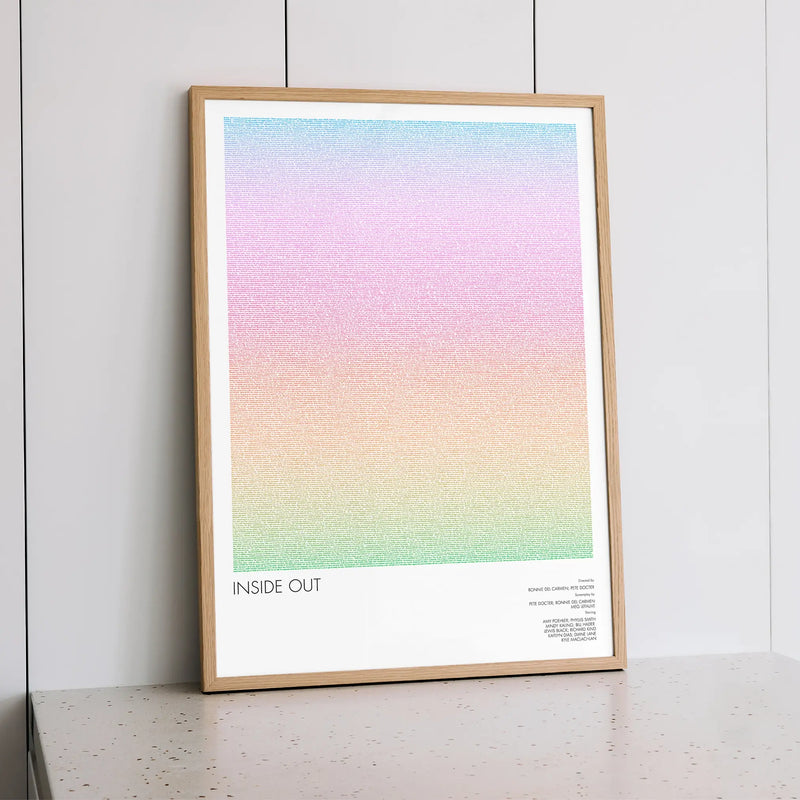 A framed Inside Out movie script poster styled within a calm interior space.