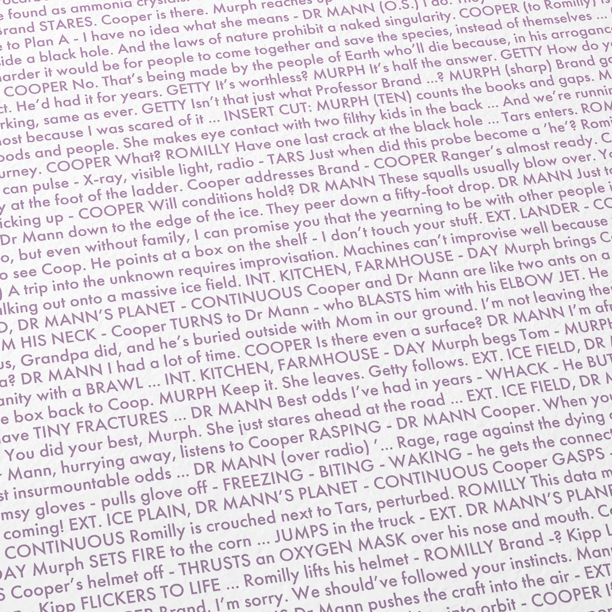 Close-up detail of the Interstellar movie script poster showing dense typographic text.