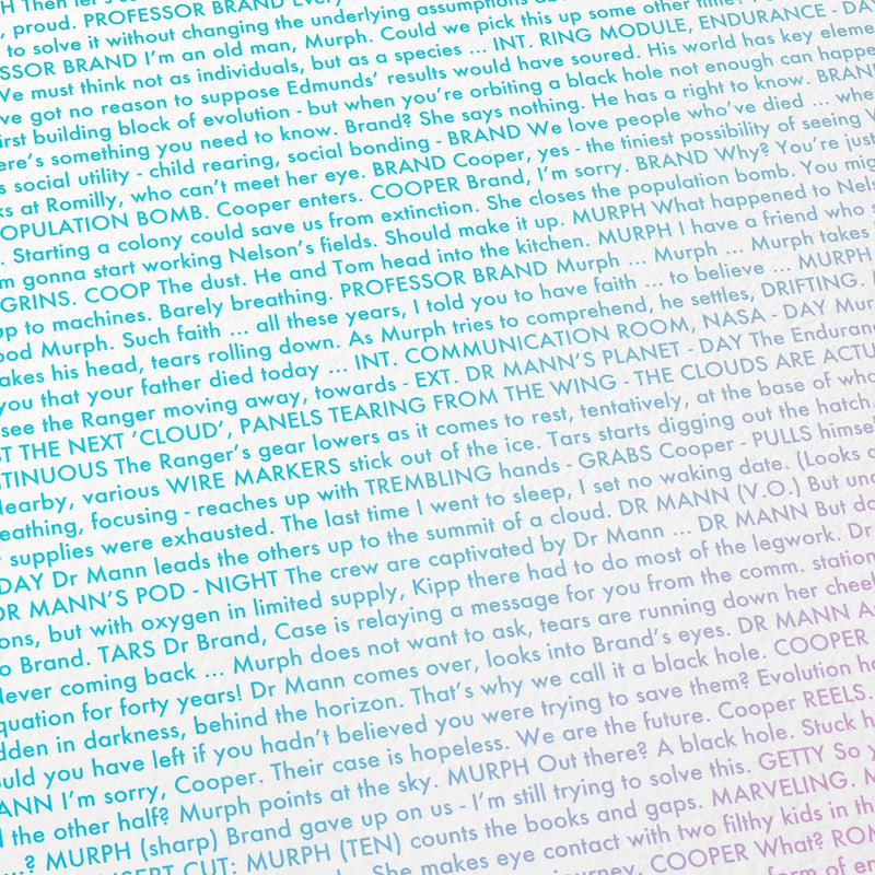 Close-up detail of the Interstellar movie script poster showing dense typographic text.