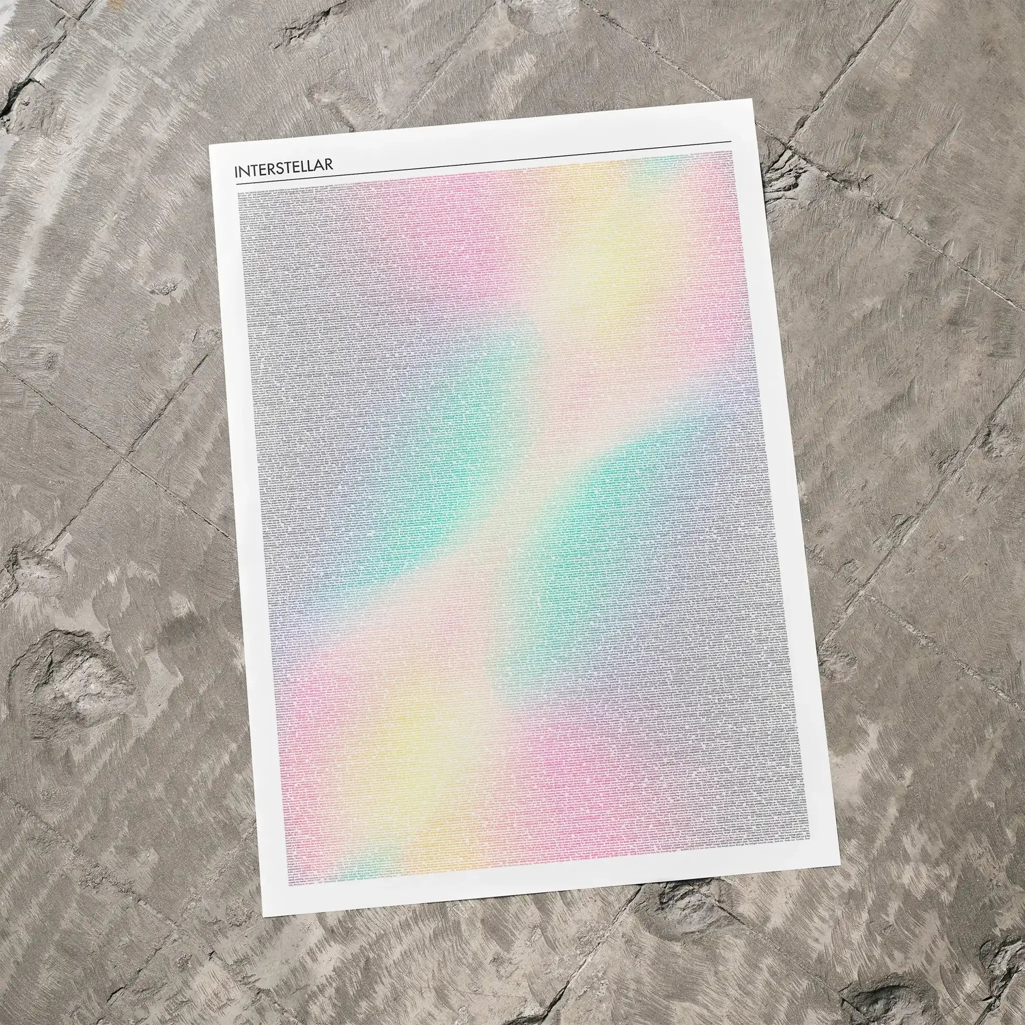 Colorful gradient poster with 'Interstellar' text on a textured gray surface