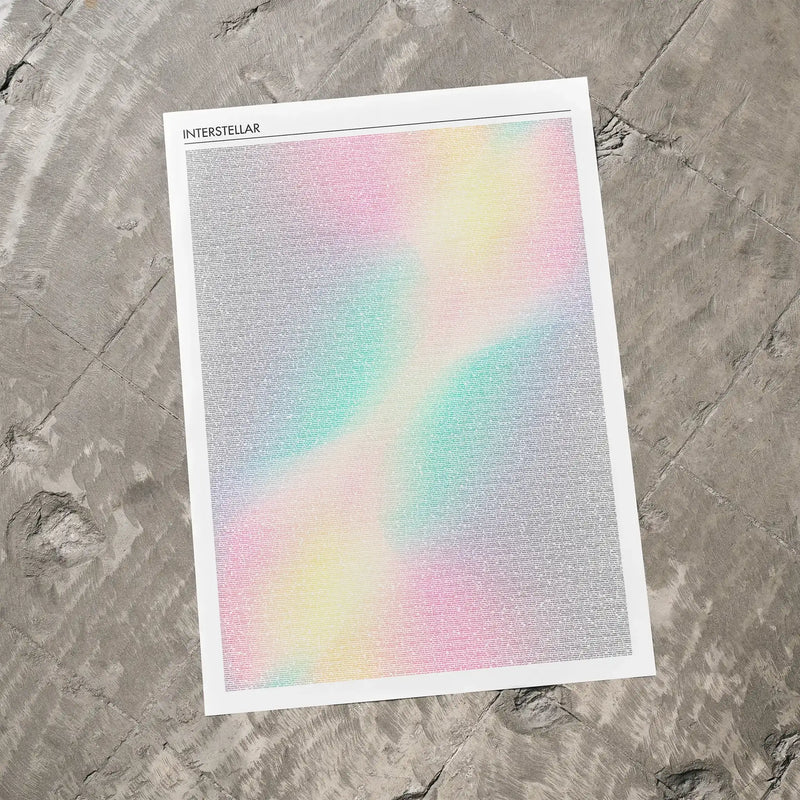 Colorful gradient poster with 'Interstellar' text on a textured gray surface