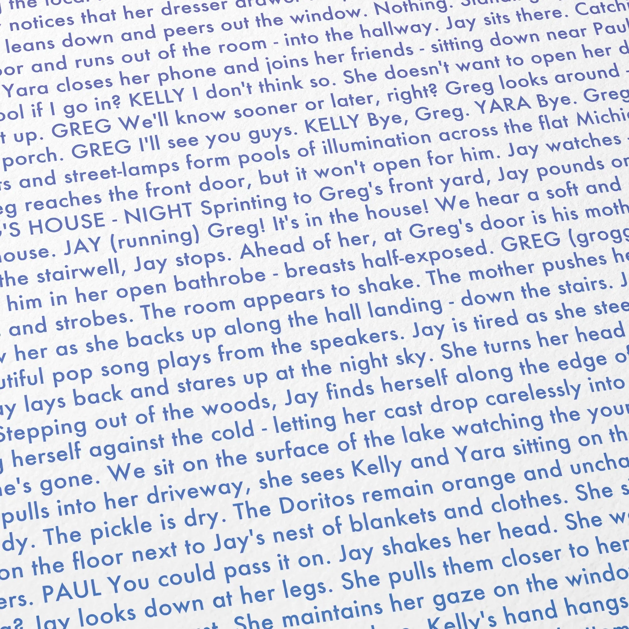 Close-up detail of the It Follows movie script poster showing dense typographic text.