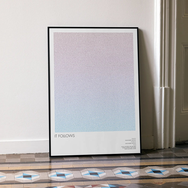 A framed It Follows movie script poster leaning against a wall in a minimalist interior.