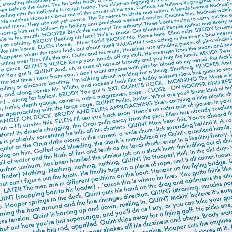 Close-up detail of the Jaws movie script poster showing dense typographic text.