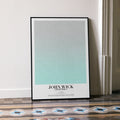 A framed John Wick: Chapter 4 movie script poster leaning against a wall in a minimalist interior.