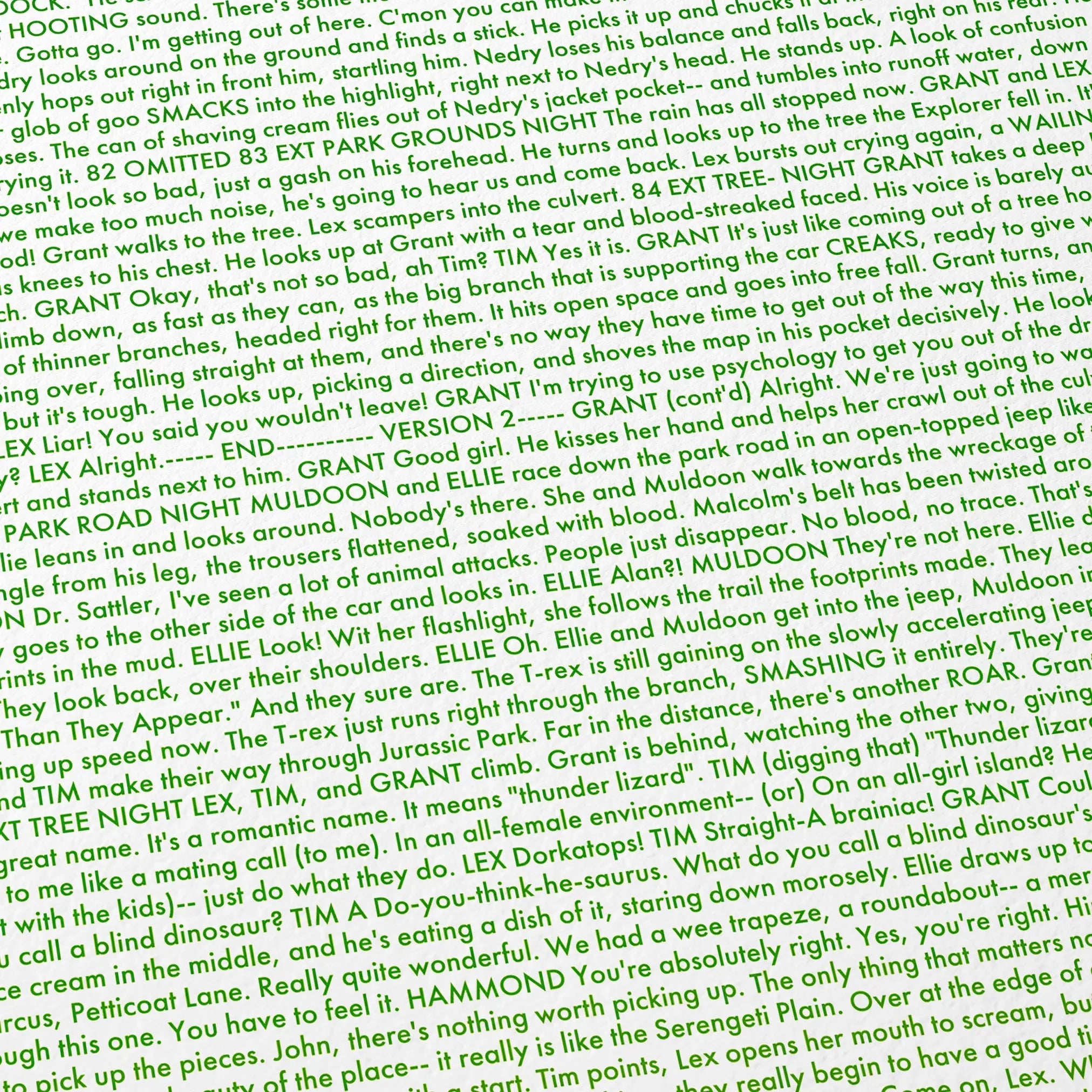 Close-up detail of the Jurassic Park movie script poster showing dense typographic text.