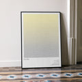 A framed Kill Bill movie script poster leaning against a wall in a minimalist interior.