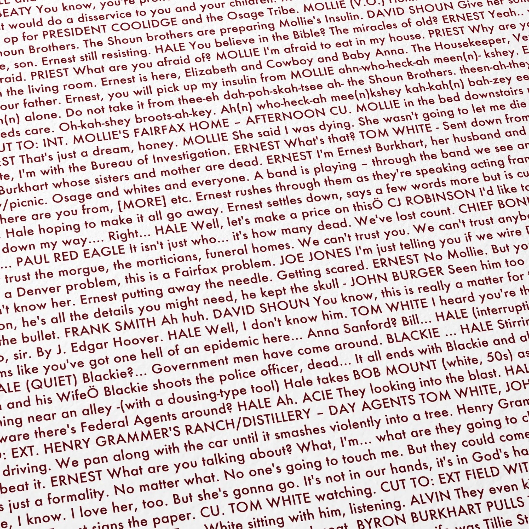 Close-up detail of the Killers of the Flower Moon movie script poster showing dense typographic text.