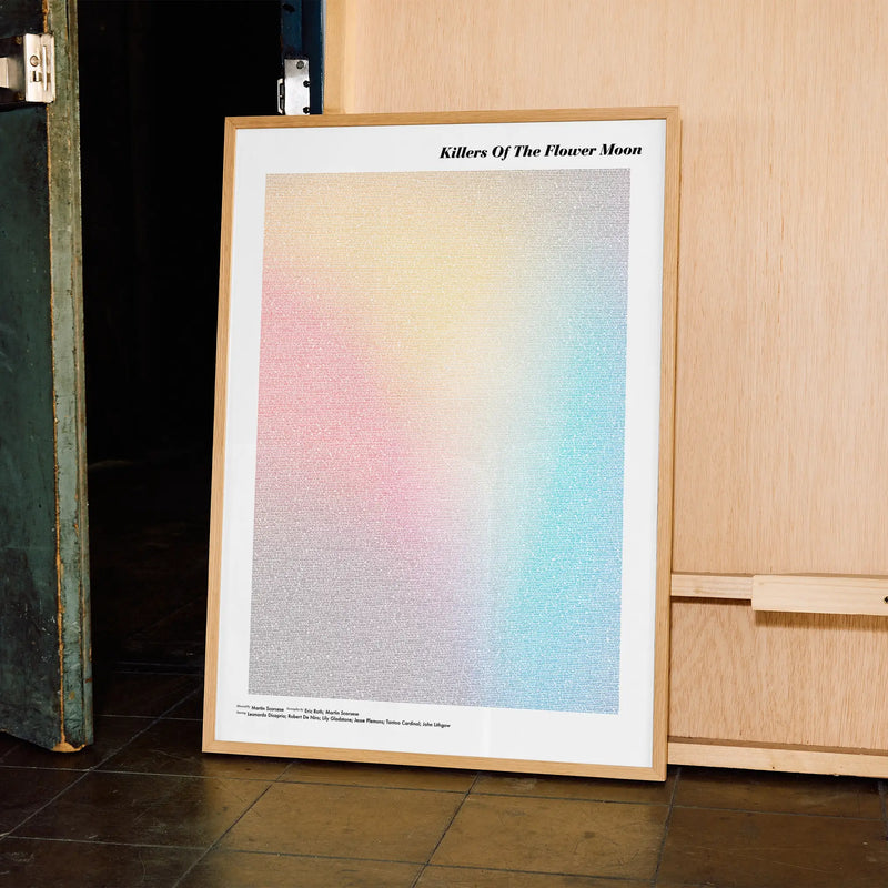 A framed Killers of the Flower Moon movie script poster displayed in a contemporary interior setting.