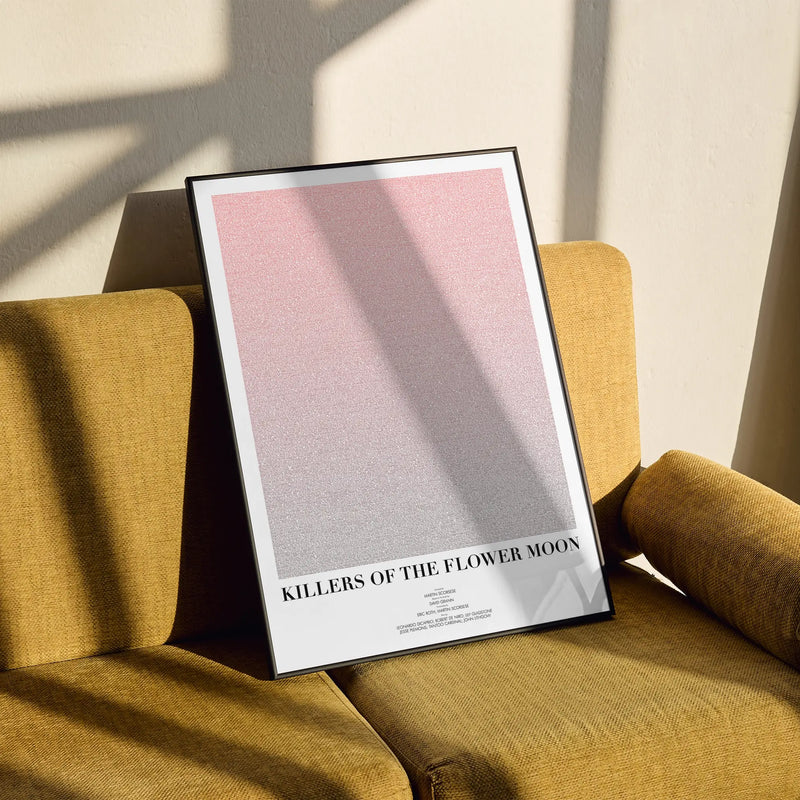 A framed Killers of the Flower Moon movie script poster styled in a clean interior setting.