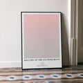 A framed Killers of the Flower Moon movie script poster leaning against a wall in a minimalist interior.