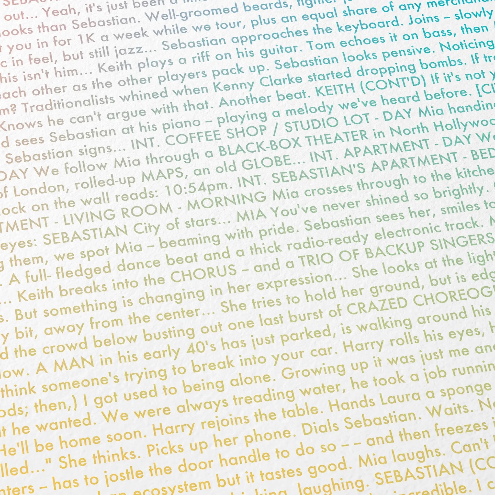 Close-up detail of the La La Land movie script poster showing dense typographic text.
