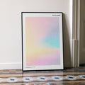 A framed La La Land movie script poster leaning against a wall in a minimalist interior.