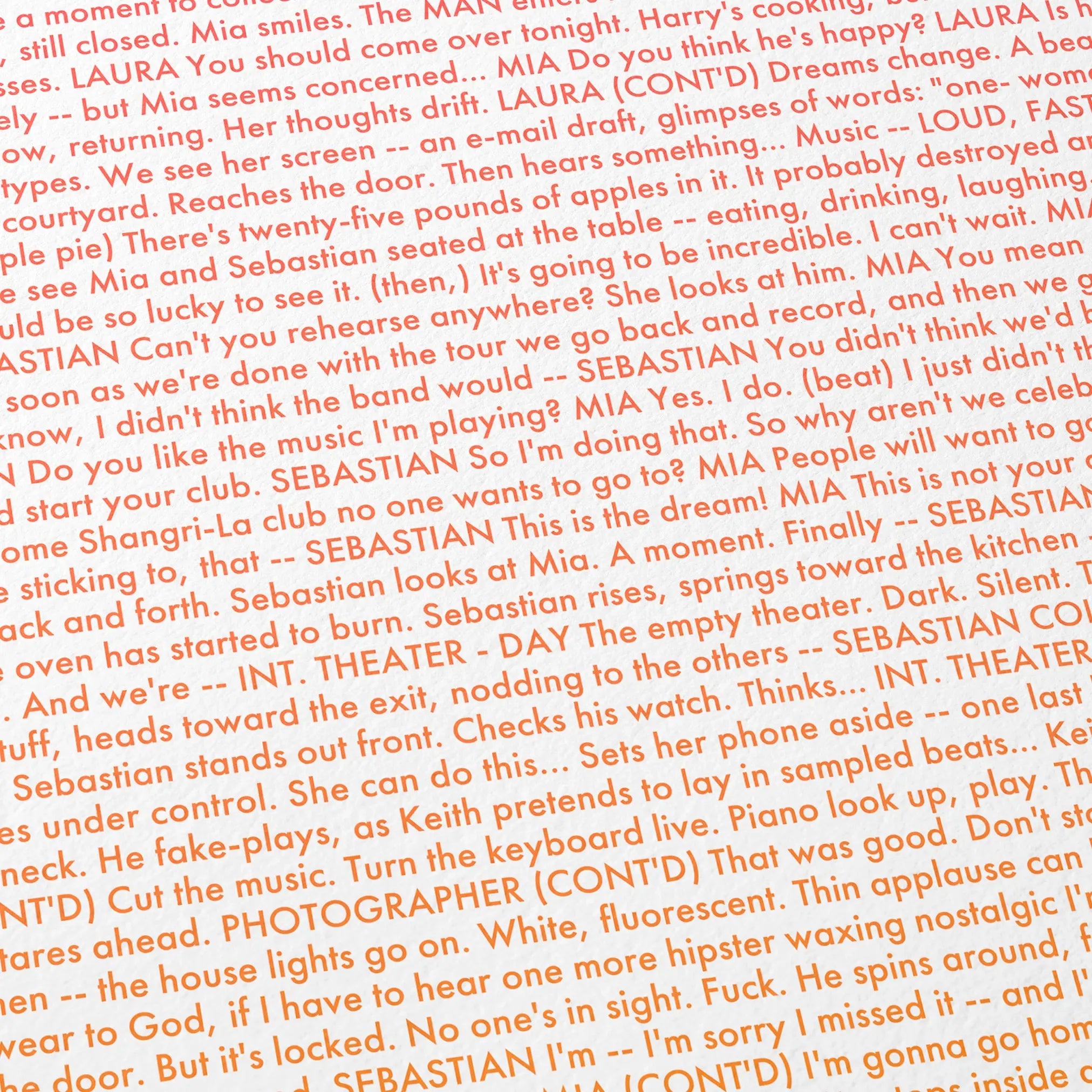 Close-up detail of the La La Land movie script poster showing dense typographic text.