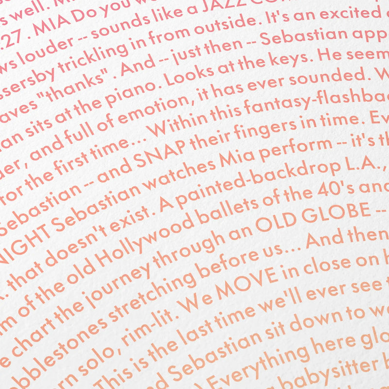 Close-up detail of the La La Land movie script poster showing dense typographic text.