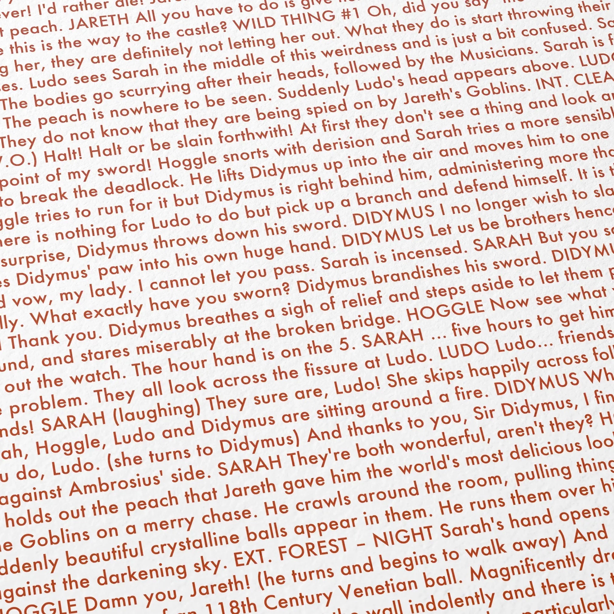 Close-up detail of the Labyrinth movie script poster showing dense typographic text.