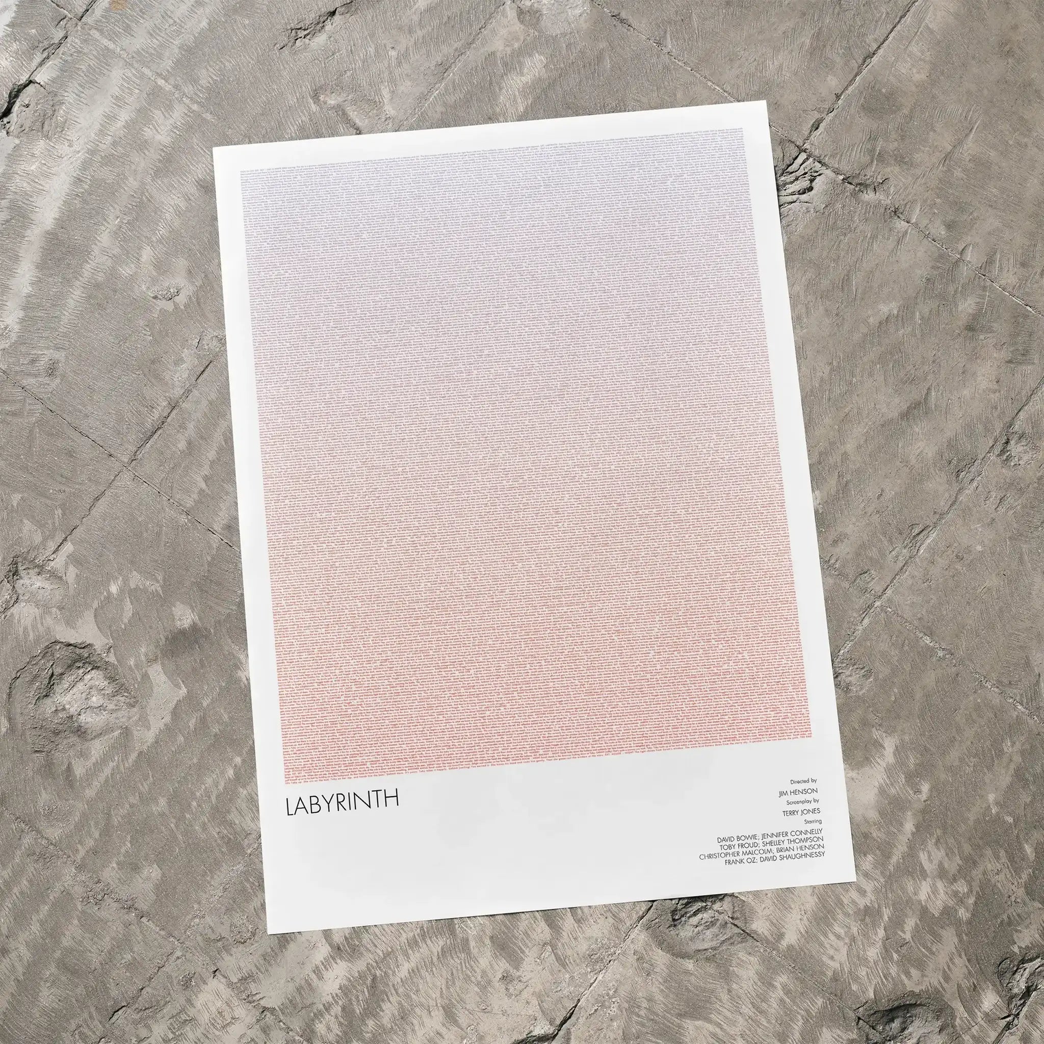 A Labyrinth movie script poster laid flat on a textured floor surface.