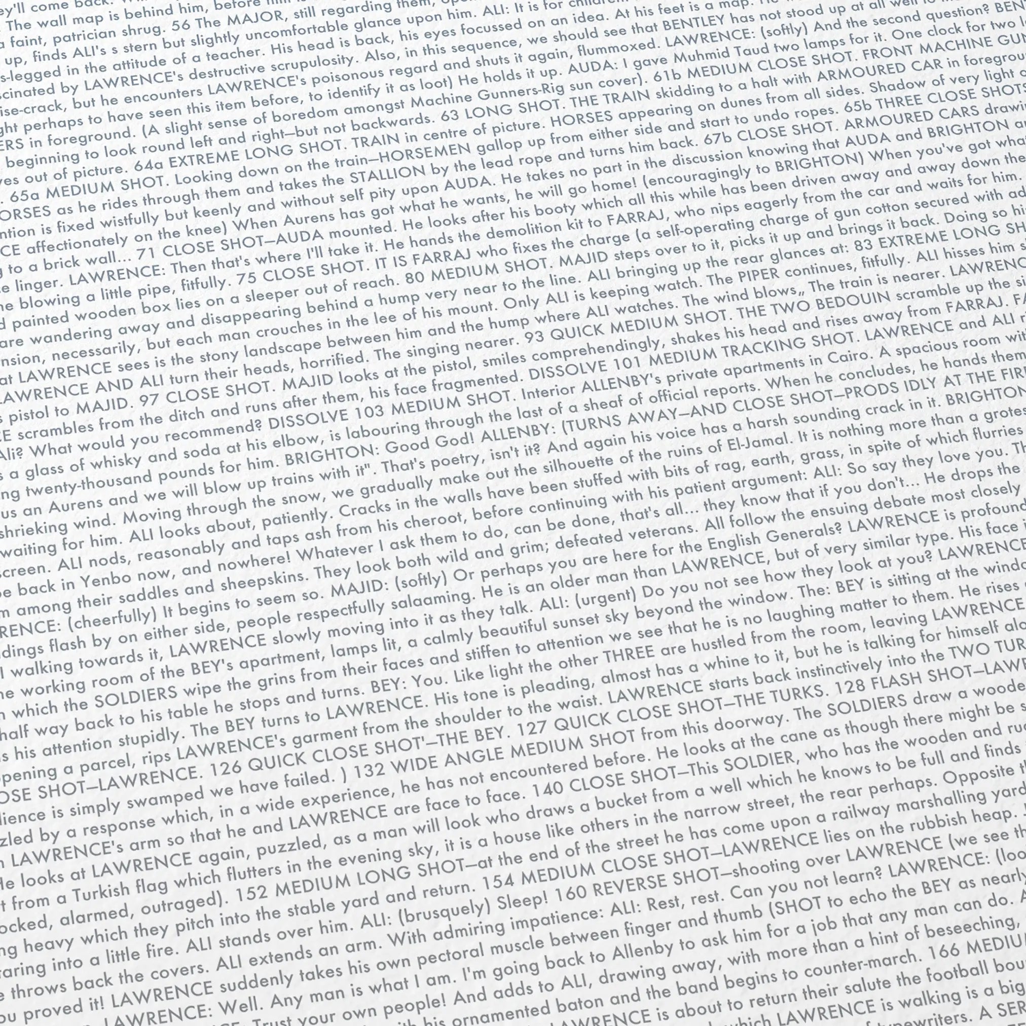 Close-up detail of the Lawrence of Arabia movie script poster showing dense typographic text.