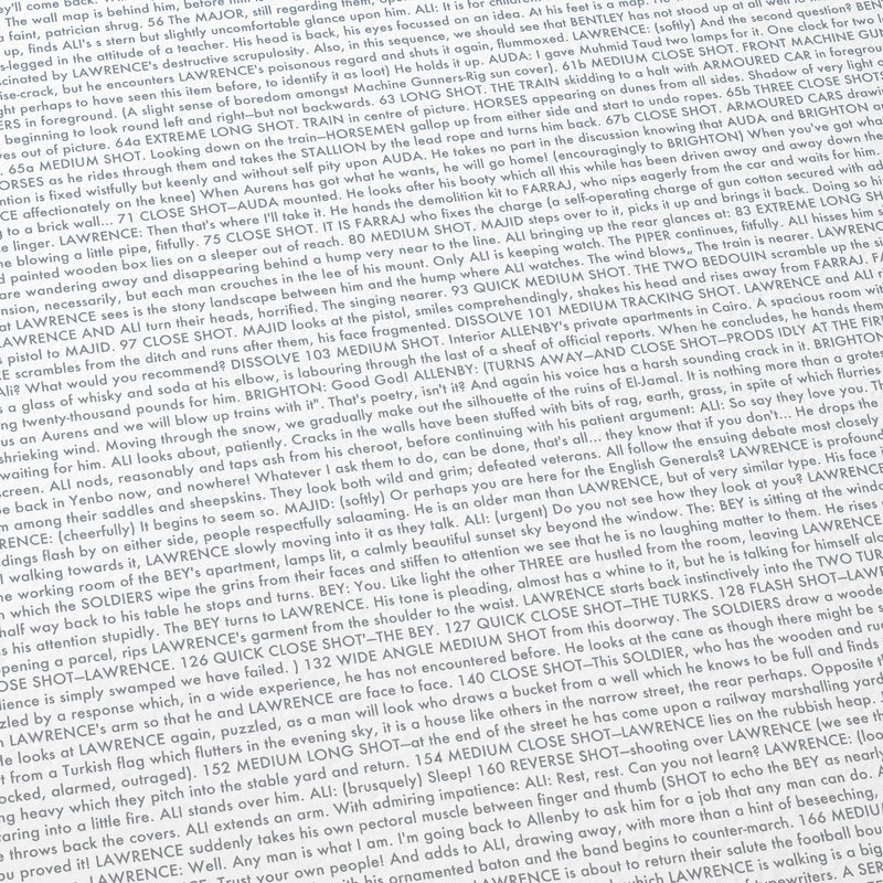 Close-up detail of the Lawrence of Arabia movie script poster showing dense typographic text.
