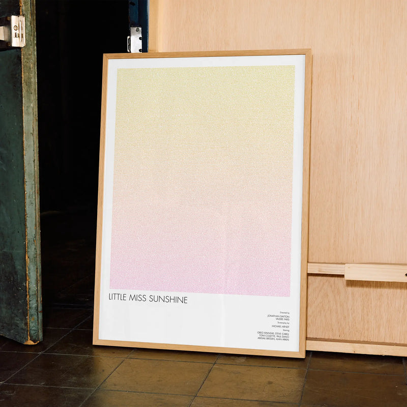 A framed Little Miss Sunshine movie script poster displayed in a contemporary interior setting.