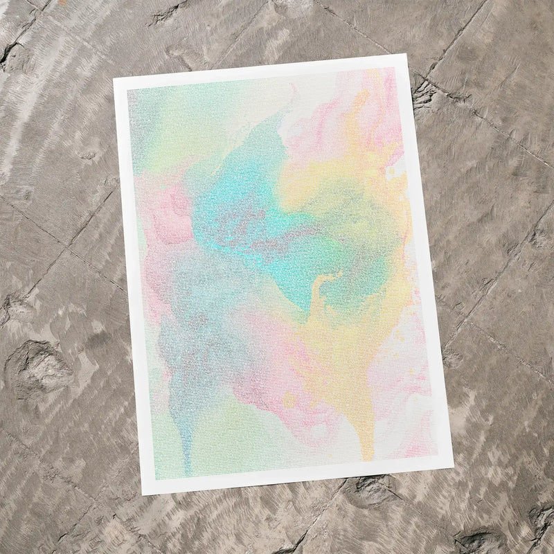 A Little Women movie script poster laid flat on a textured floor surface.