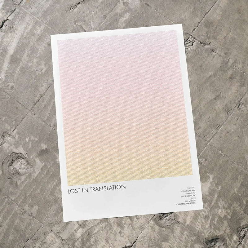 A Lost in Translation movie script poster laid flat on a textured floor surface.