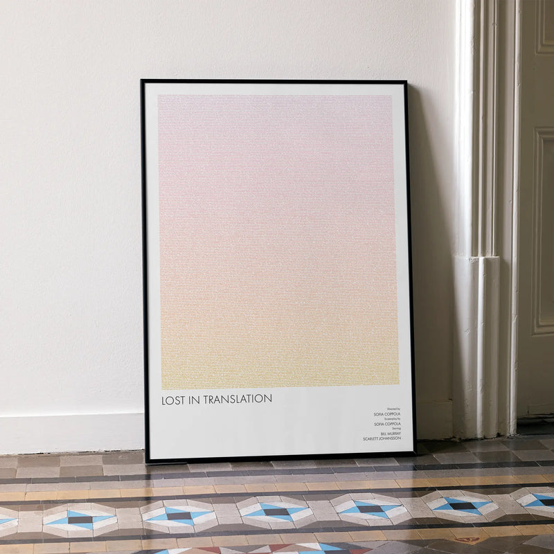 A framed Lost in Translation movie script poster leaning against a wall in a minimalist interior.