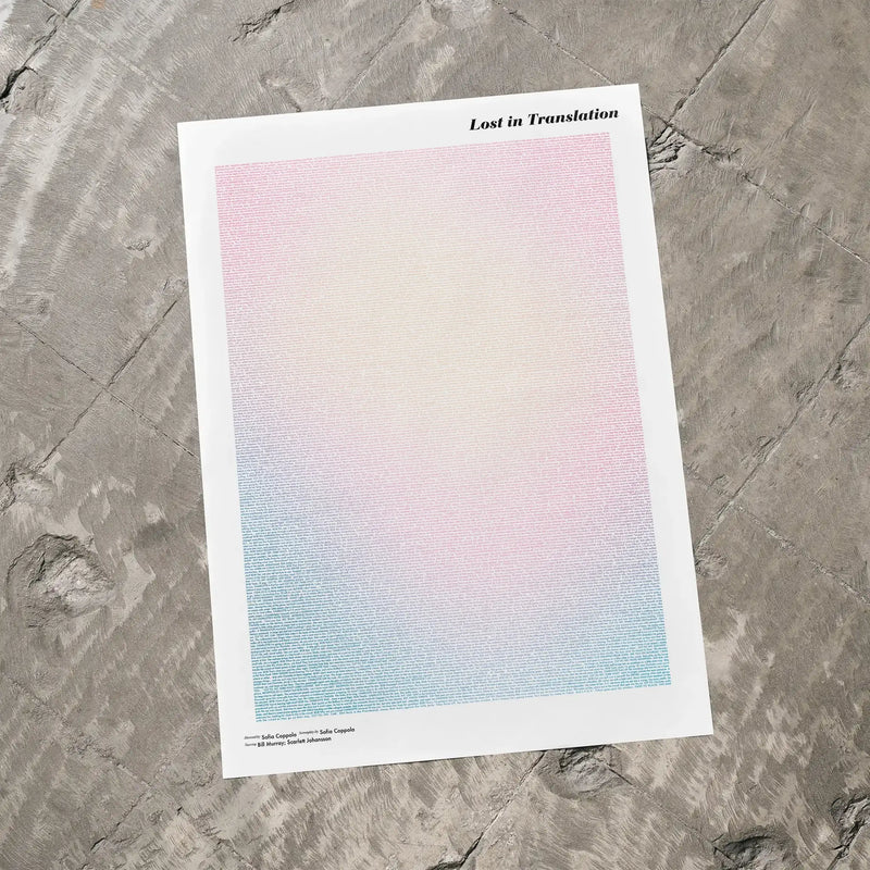 A Lost in Translation movie script poster laid flat on a textured floor surface.
