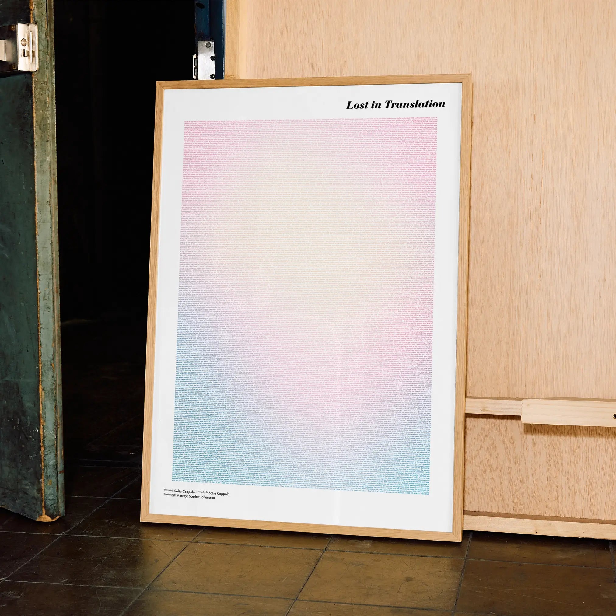 A framed Lost in Translation movie script poster displayed in a contemporary interior setting.