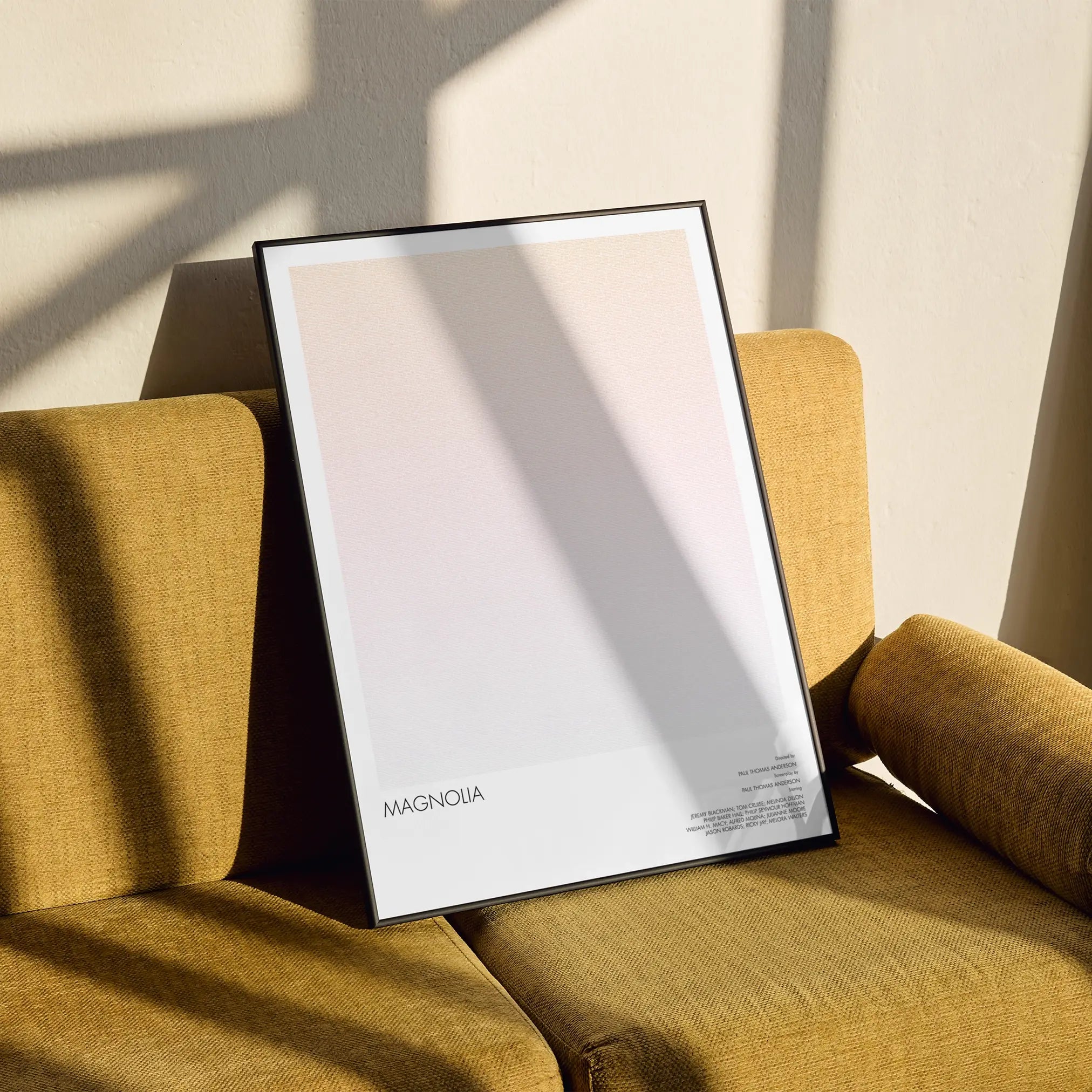 A framed Magnolia movie script poster styled in a clean interior setting.