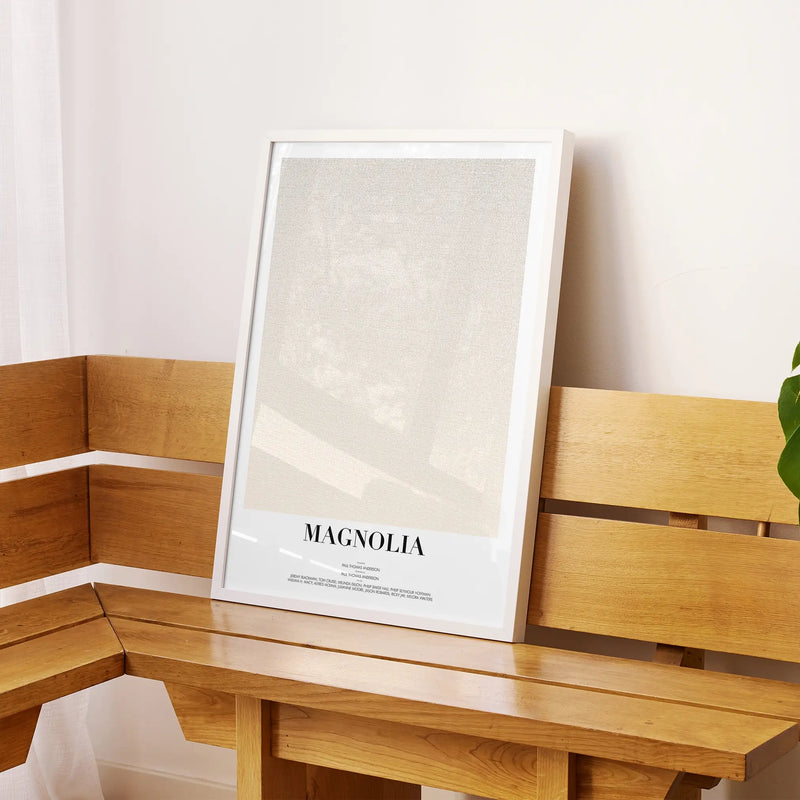 A framed Magnolia movie script poster displayed on a sideboard in a contemporary space.