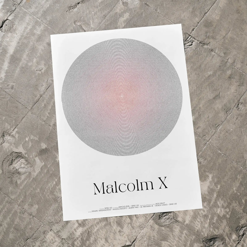 Poster with a circular design and 'Malcolm X' text on a textured surface