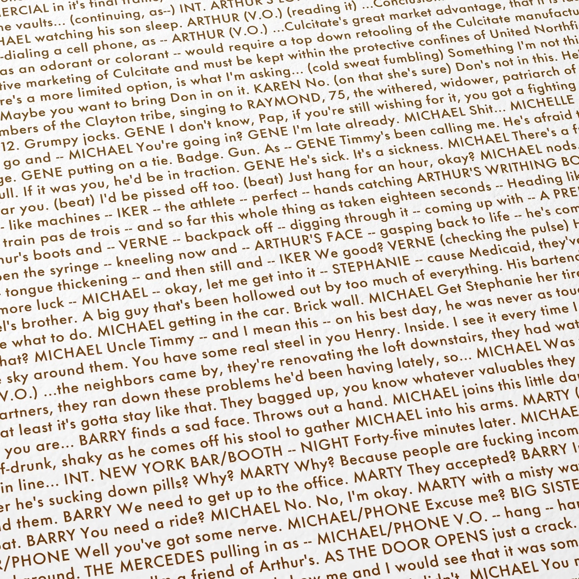 Close-up detail of the Michael Clayton movie script poster showing dense typographic text.