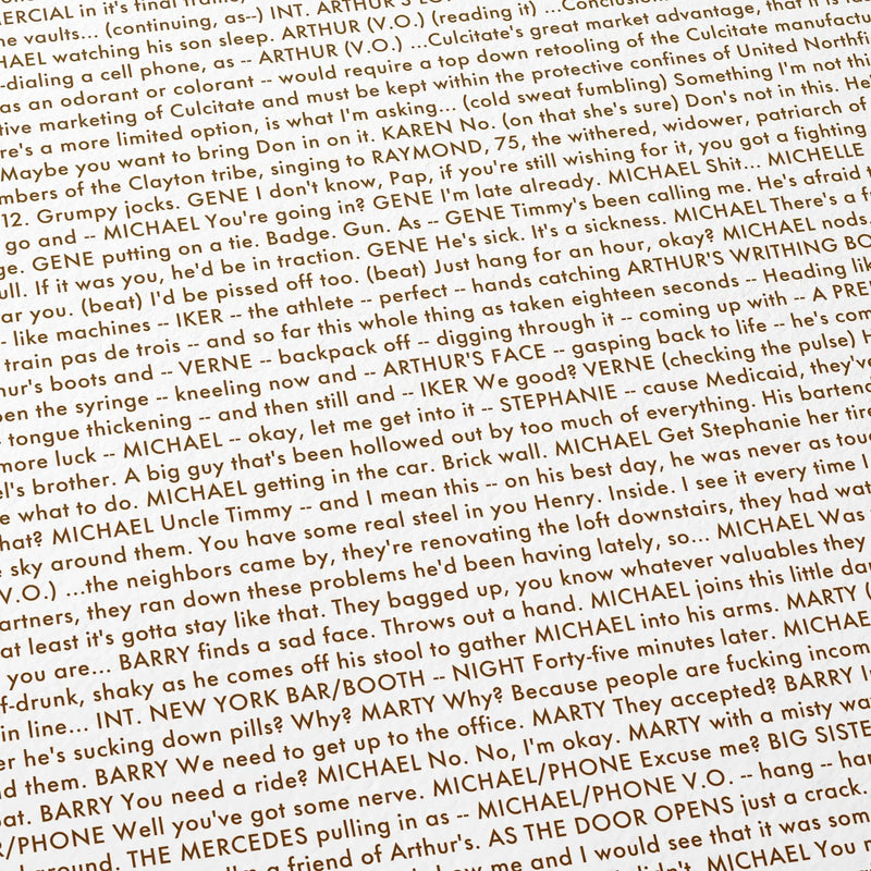 Close-up detail of the Michael Clayton movie script poster showing dense typographic text.
