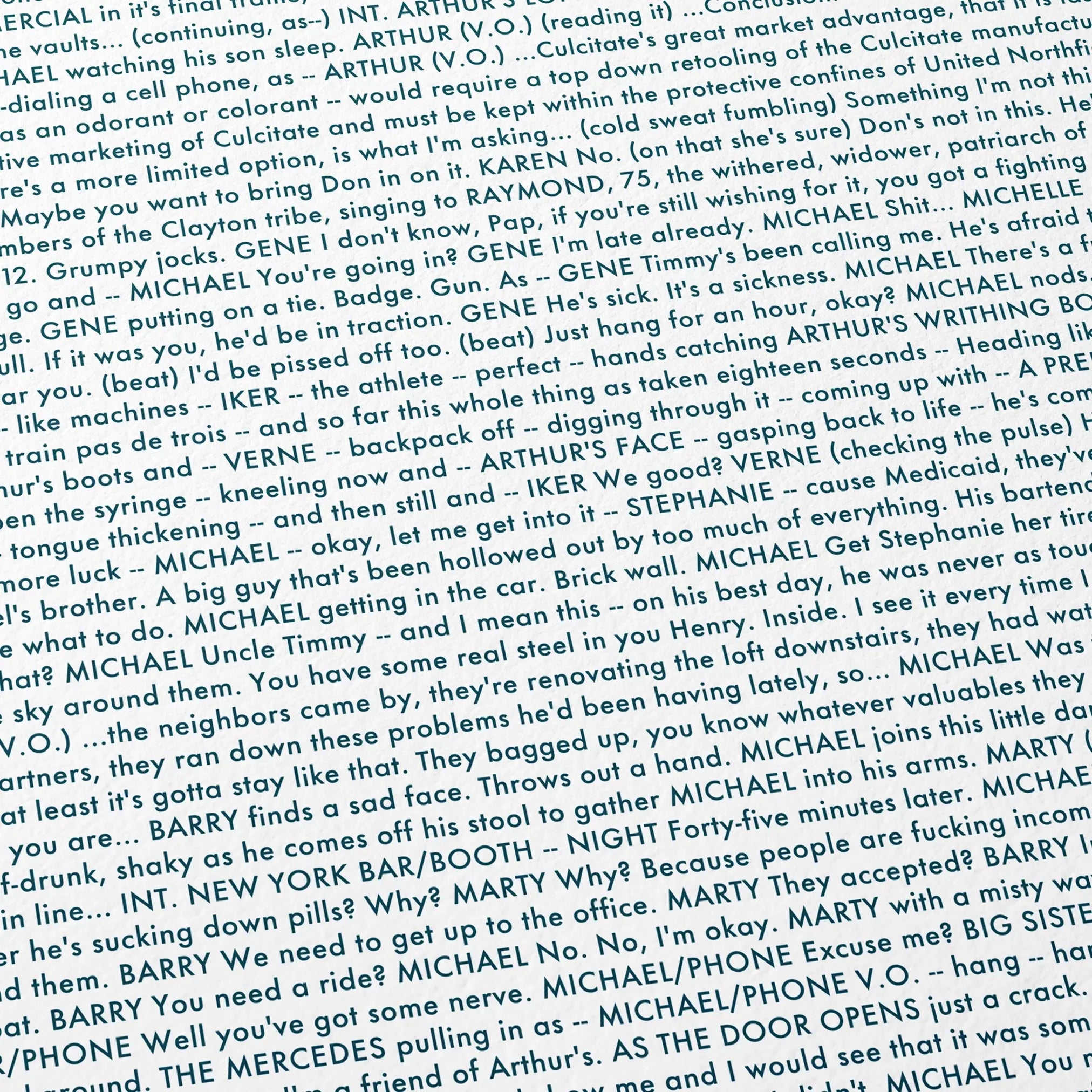 Close-up detail of the Michael Clayton movie script poster showing dense typographic text.