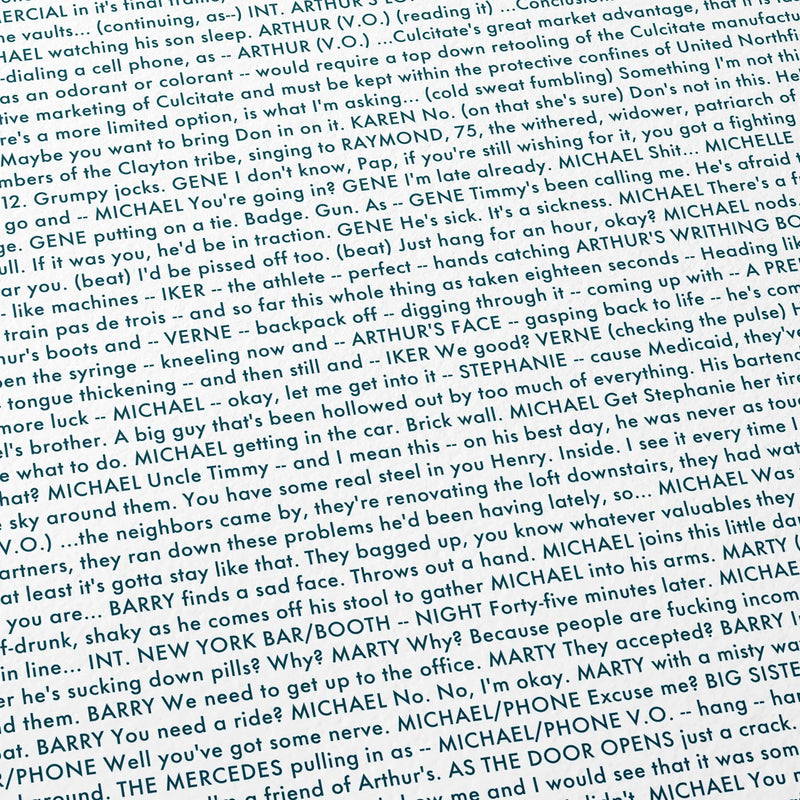 Close-up detail of the Michael Clayton movie script poster showing dense typographic text.
