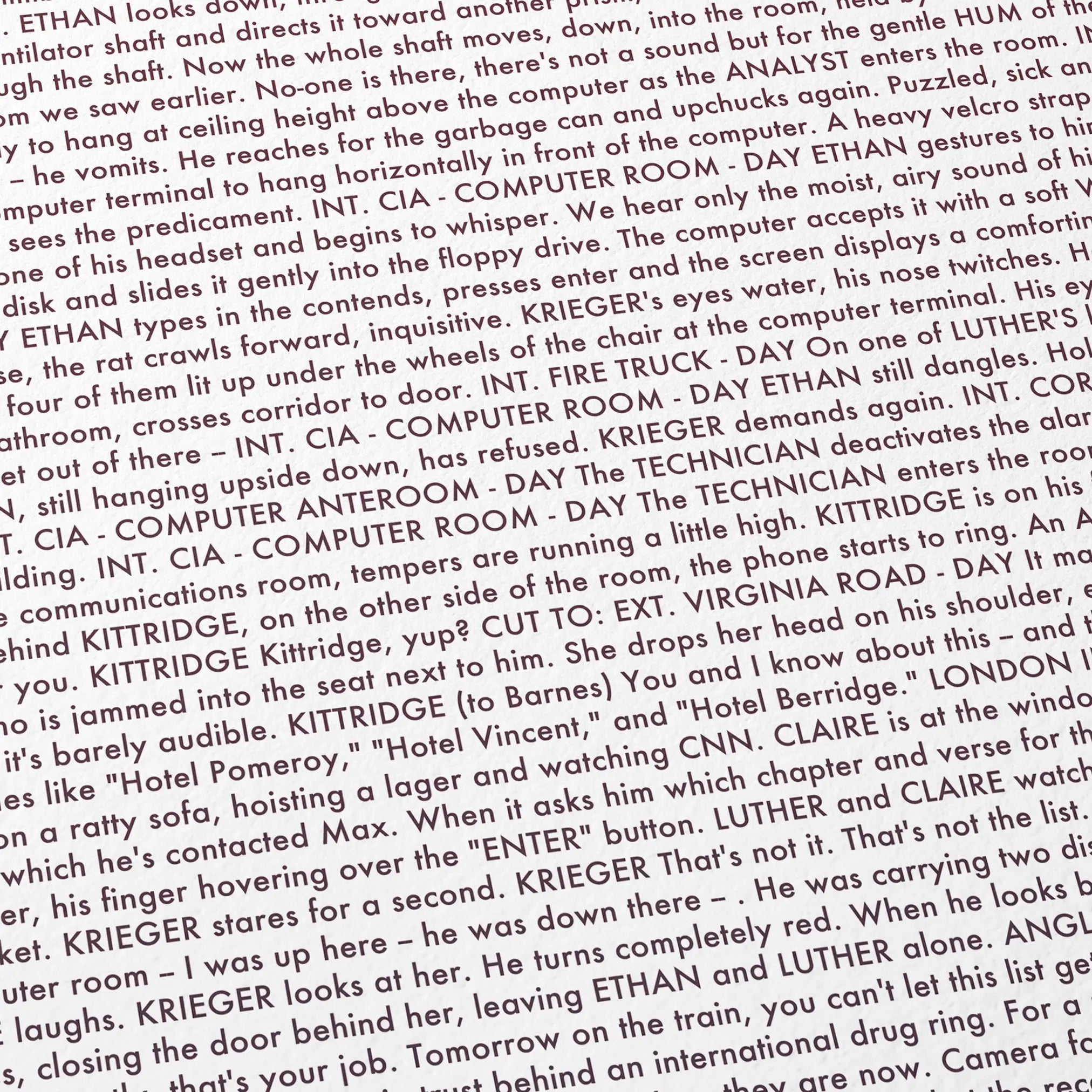 Close-up detail of the Mission: Impossible movie script poster showing dense typographic text.