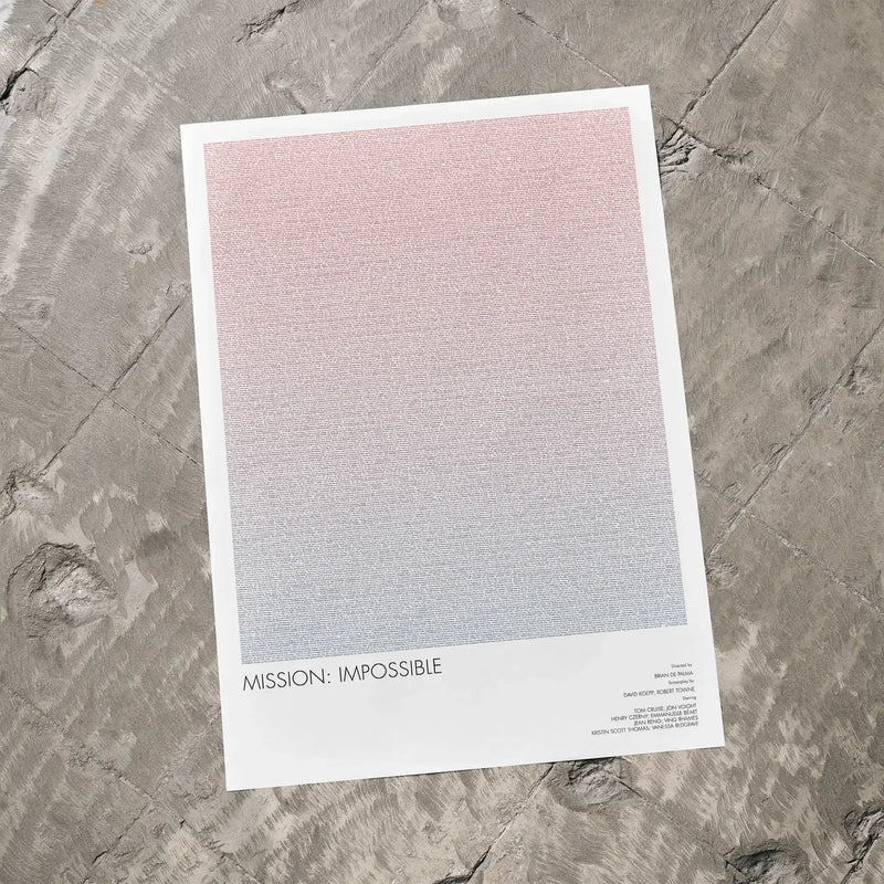 A Mission: Impossible movie script poster laid flat on a textured floor surface.
