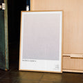 A framed Mistress America movie script poster displayed in a contemporary interior setting.