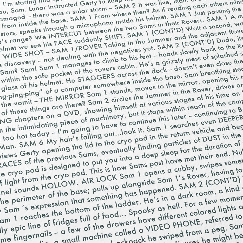 Close-up detail of the Moon movie script poster showing dense typographic text.