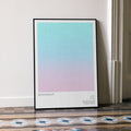 A framed Moonlight movie script poster leaning against a wall in a minimalist interior.