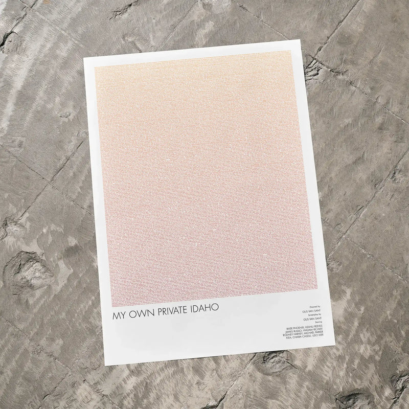 A My Own Private Idaho movie script poster laid flat on a textured floor surface.
